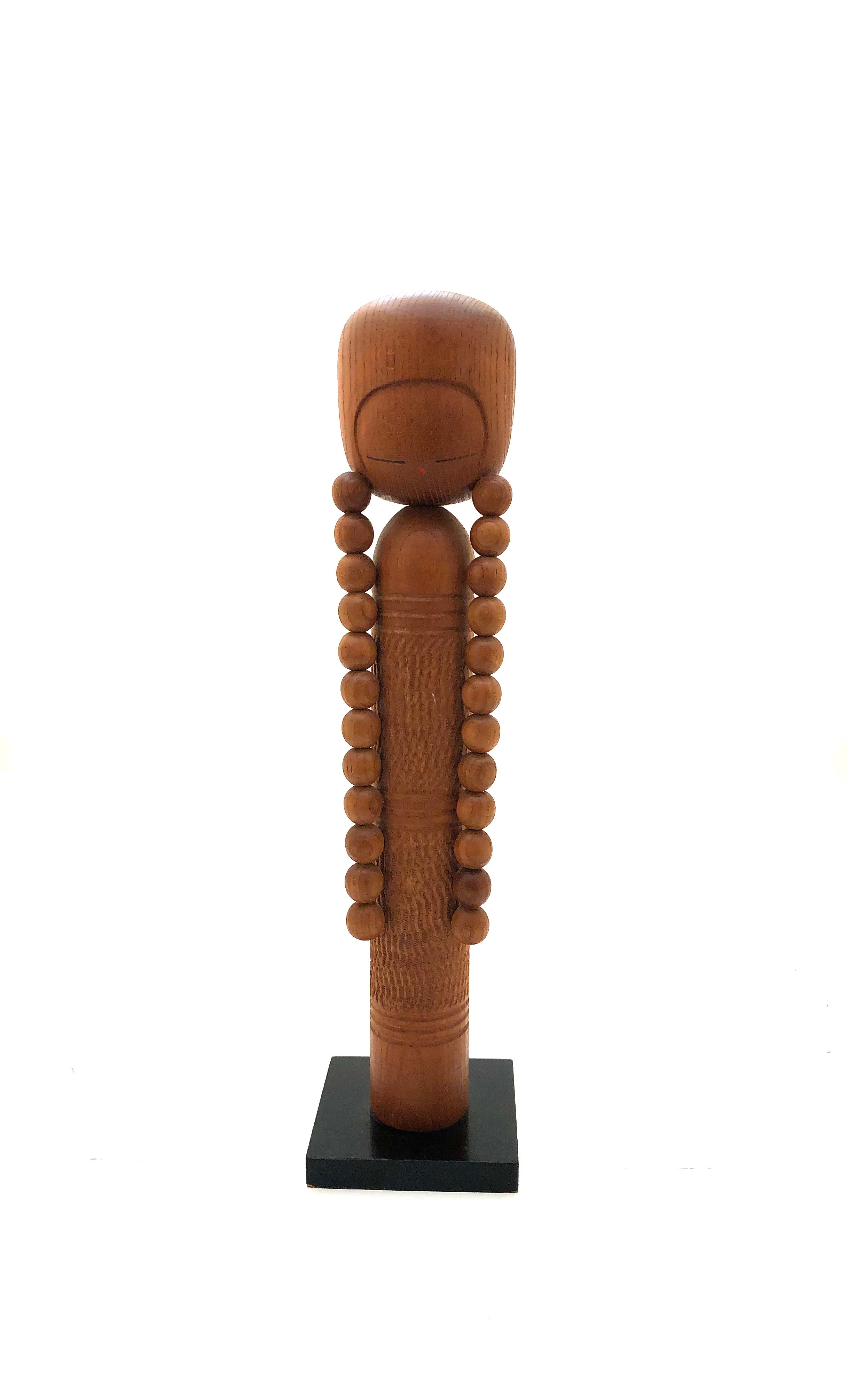 Vintage Sosaku Kokeshi entitled: “Osage | Pigtails” by Aida, Seihou