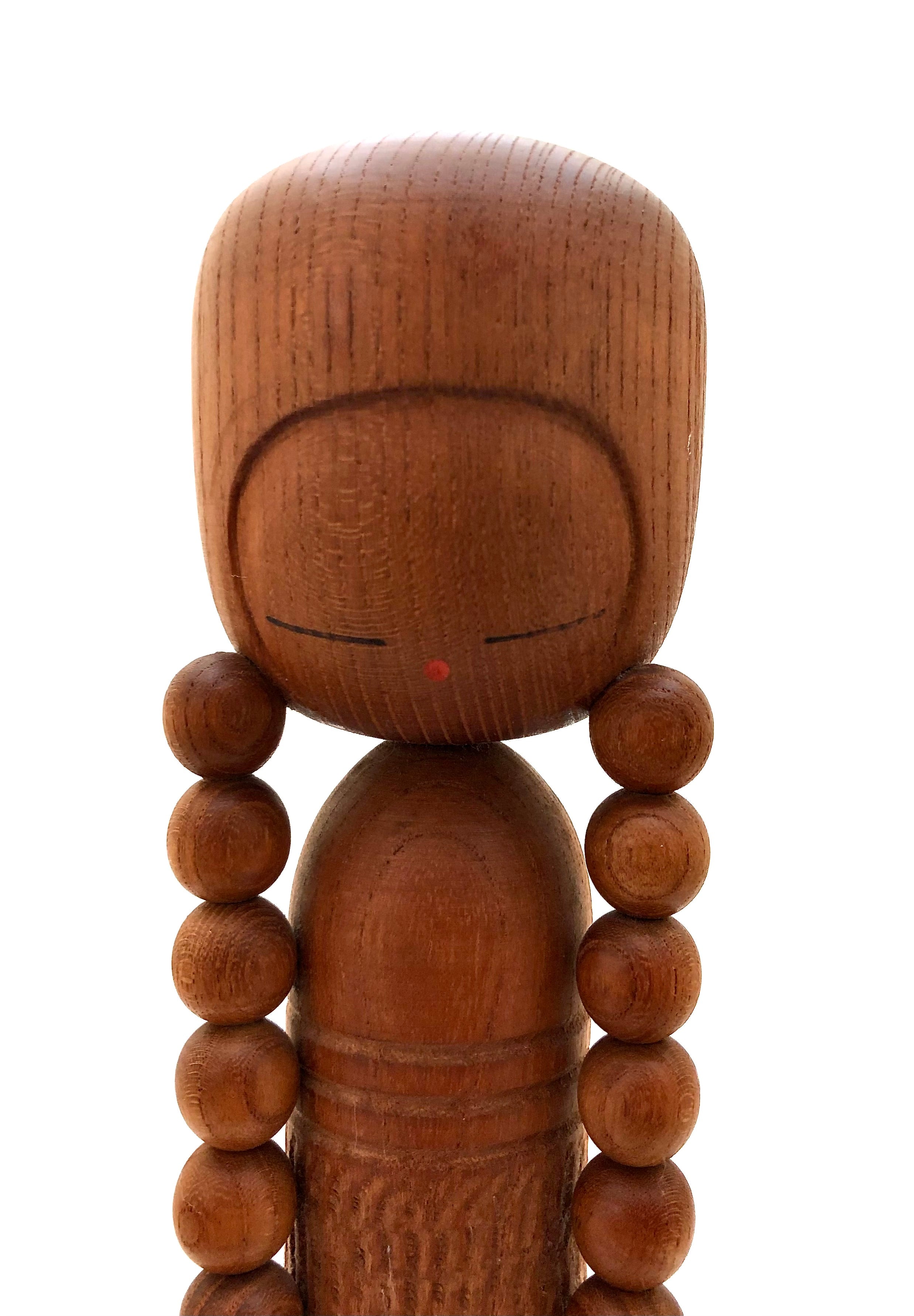 Vintage Sosaku Kokeshi entitled: “Osage | Pigtails” by Aida, Seihou