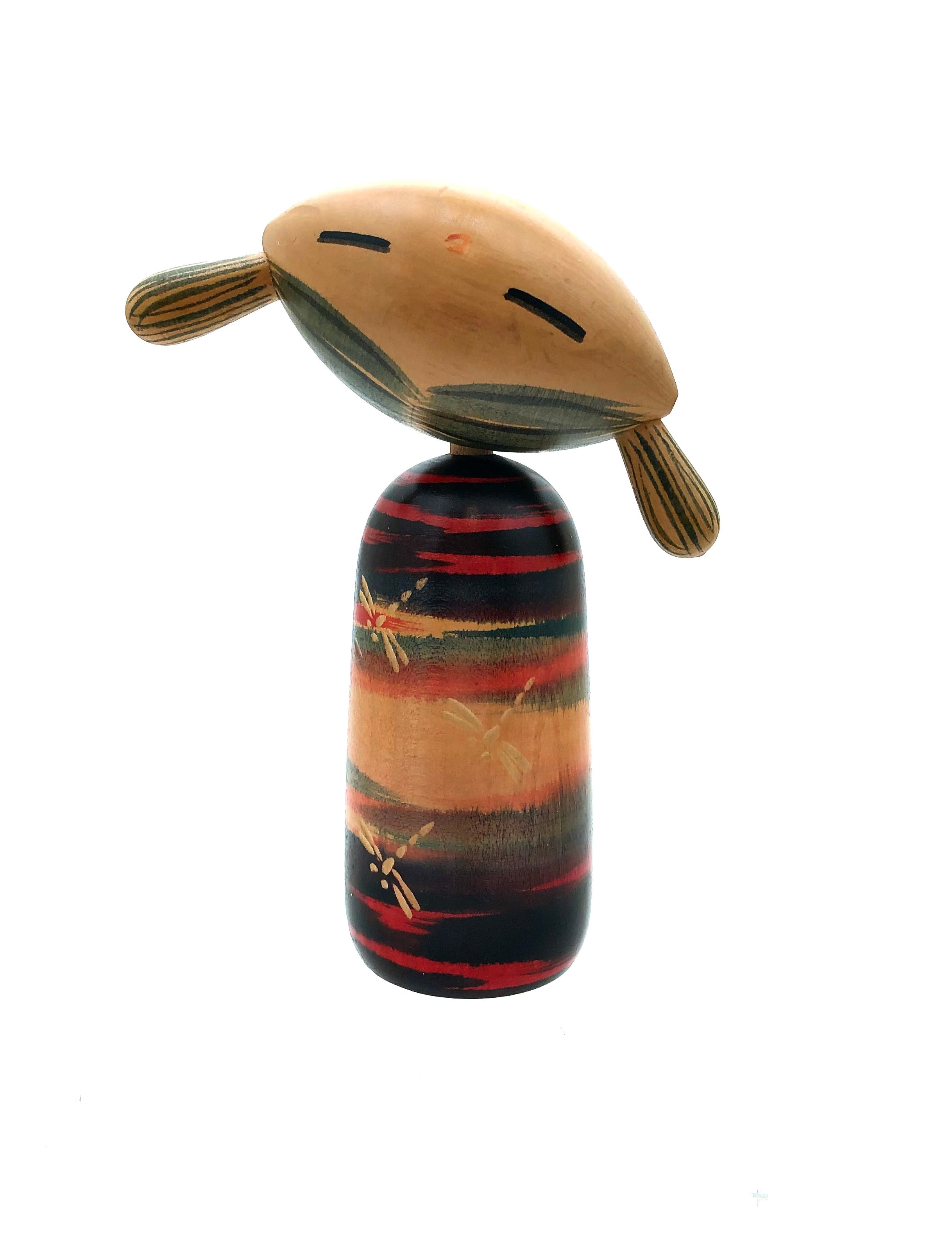 Vintage Sosaku Kokeshi entitled: “Nichibotsu-ji no dorogonfurai | Dragonfly at Sunset” by Tsujita, Tatsuya