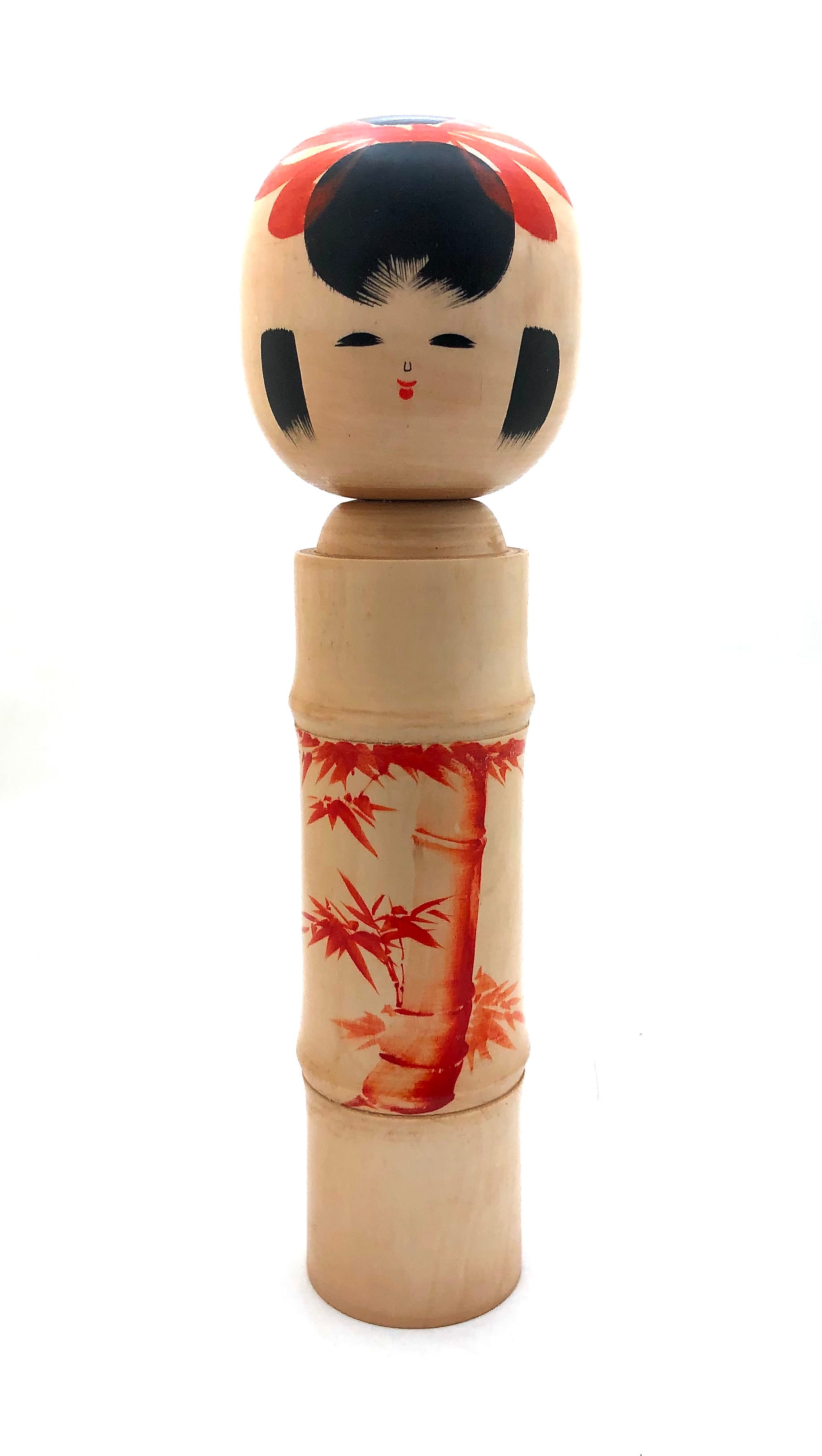 Vintage Sosaku Kokeshi entitled: “Akai take | Red Bamboo” by Sato Kouson (a.k.a. Komura)