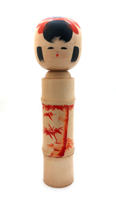 Vintage Sosaku Kokeshi entitled: “Akai take | Red Bamboo” by Sato Kouson (a.k.a. Komura)